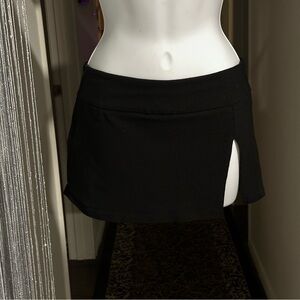 low waist black mini skirt with leg slit